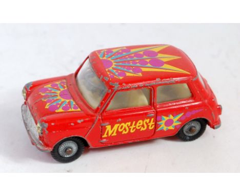 A Corgi Toys No. 349 Pop Art Morris Mini comprising red body with lemon interior and four psychedelic labels to read "Mostest