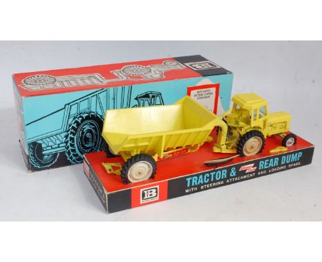 A Britains No. 9630 Fordson tractor and rear dump, rare yellow version with grey hubs, sold in the original lift-off lid all-