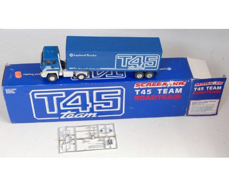 A Scalextric No. C370 T45 Race Team road train articulated tractor unit and trailer, two examples both housed in the original