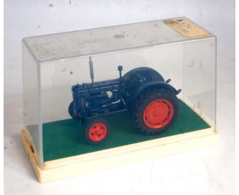 A D Godburn? 1/32 scale white metal and resin model of a Fordson Major diesel tractor (E27N), comprising of dark blue body wi