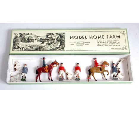 A Britains Hunt series hunting figure and hounds group to include two mounted hunt figures, together with four walking hunt f