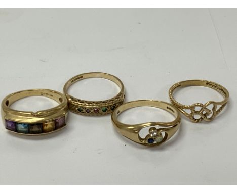 Four 9ct gold rings. Approximately 7.80g. Postage category A.