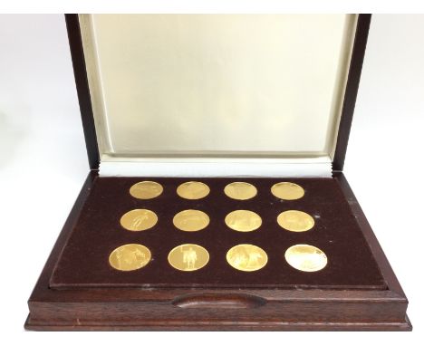 A cased set of John Pinches 24 carat gold on bronze The Treasures Of Pompeii medallions, postage category C