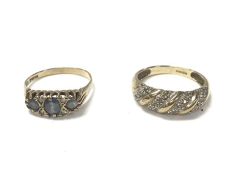Two 9ct gold rings. A diamond and sapphire ring m 1/2 and a diamond chips ring size n 1/2. 4.82g total.