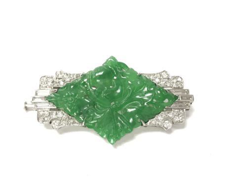 A quality 1920s platinum Art Deco brooch set with diamonds and imperial green jade. Approximately 48mm wide. Postage B