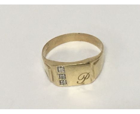 A Gents 9carat gold ring set with three small diamonds and initials P weight 3g