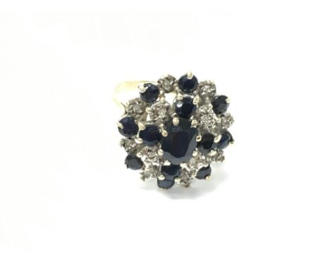 9ct white and yellow gold ring set with sapphires and diamonds. Size N 1/2. Comes with Gem report.Postage B