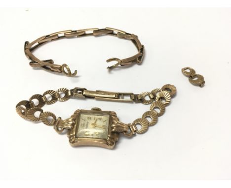 A 9ct gold ladies rotary watch with another 9ct gold ladies watch strap and extra links. Approx weight 11.14 grams