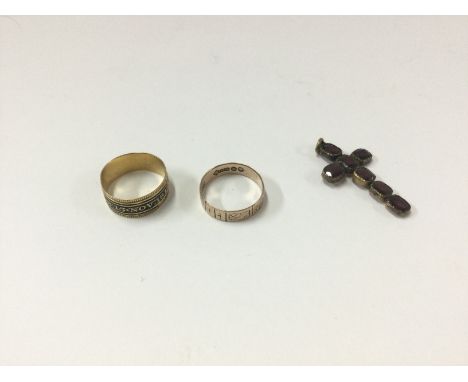 An 18ct and 9ct gold ring with and amethyst set cross. Approx 6.7 grams.