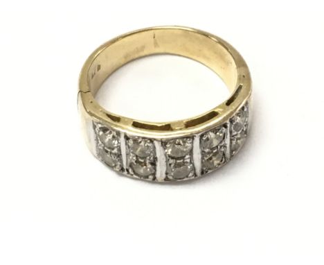 A 9ct gold ring set with 10 diamonds. Size M and 4.21g. Comes with Gem report.Postage A