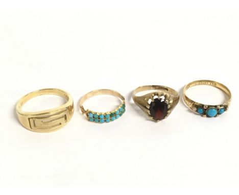Four gold rings sizes T,L,L/M,P. Some turquoise stone set rings and a Garnet stone set ring.11.2g Postage category A