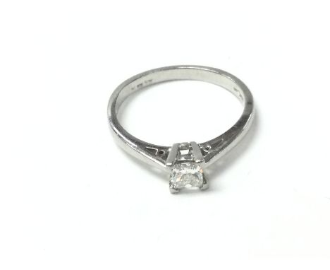 A platinum princess cut diamond solitaire ring with certificate. Diamond 0.25ct size O Postage A