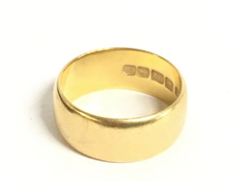 A 22ct gold wedding ring, size P. 8.8g Postage category A