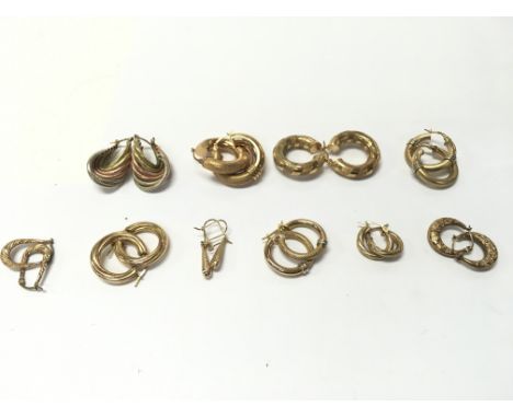 10 pairs of gold earrings. 25.27g Postage A