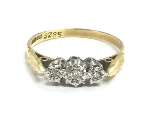 An 18ct gold ring set with three chip stone diamonds. Size O. 2.3g. Postage category a