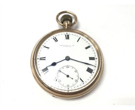 A 9ct gold open face pocket watch by Thomas Russell. 84.50g. Approx 50mm case diameter. Not seen running.