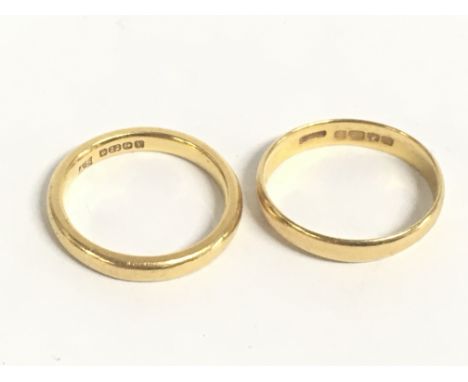 22 carat gold wedding band rings, both size K. Total weight 6.4g. Postage category A