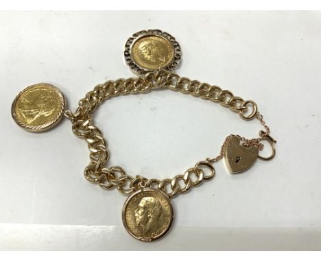 A 9ct gold bracelet with 2 Sovereign and Half Sovereign coins in mounts 1929 full, 1894 full, 1914 1/2. Total weight 50.55g. 