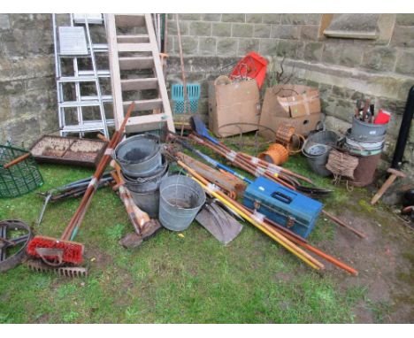 A large collection of assorted garden tools, metalware etc