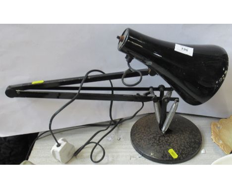 A vintage angle poise lamp
