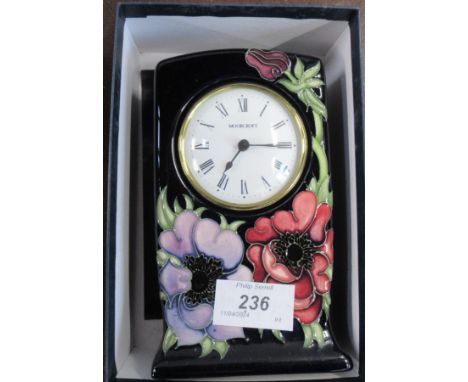 A Moorcroft clock, height 6ins