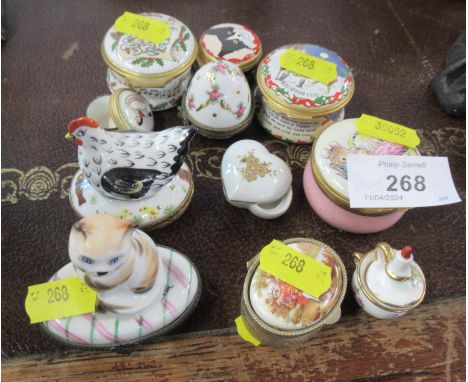A collection of enamel patch boxes, including 19th century examples