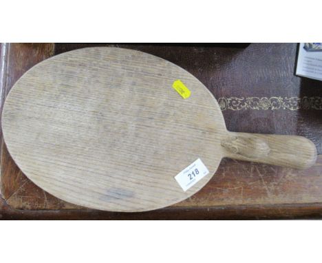 A Robert 'Mouseman' Thompson cheeseboard, with carved mouse on the handle, width 15ins