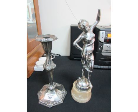 Metal candle stick + metal figure on marble base