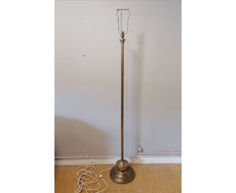 Brass column standard lamp. 145 cm high and shade 