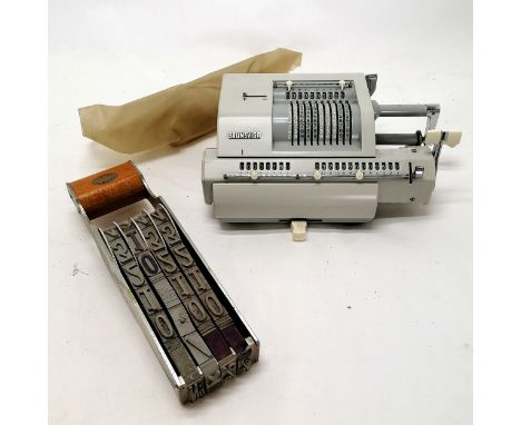 Brunsviga vintage calculating machine T/W a large scale numerical interchangeable stamp 28cm long. Some deterioration to the 