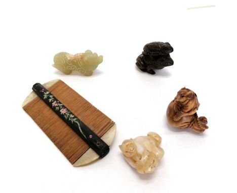 2 wooden netsuke animals, a semi precious stone monkey a hippo and a comb. 