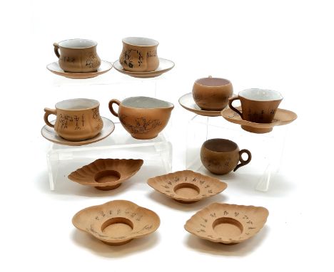 Qty of Oriental stoneware cups / saucers / jug with crackle glaze to interiors - some impressed marks to bases ~ 2 have tiny 