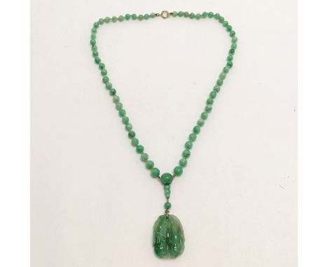 Antique Chinese spinach jade bead (largest bead 10mm in diameter) necklace with a hand carved pendant and has a 9ct gold clas