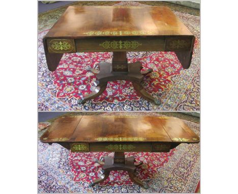 SOFA TABLE, Regency rosewood and brass inlaid with drop flaps and a single frieze drawer on a pedestal column with a raised p
