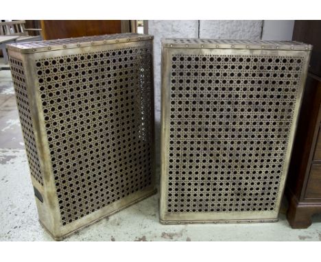 CONSOLE/RADIATOR COVERS, early 20th century, French, silvered metal, with allover pierced lattice design, each 104cm H x 73cm