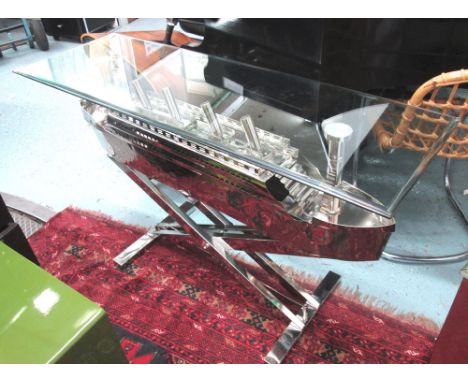 CONSOLE TABLE, with glass top, with four funneled liner below in chromed metal on chromed metal base, 130cm x 43cm x 80cm H. 