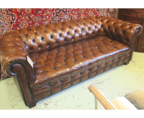 CHESTERFIELD SOFA, in brown leather, buttoned, 213cm W x 88cm D x 76cm H.