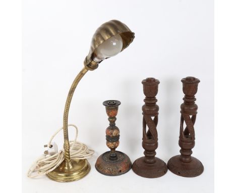 A pair of Burmese carved hardwood lamp bases, Kashmiri lacquered painted and gilded lamp base, and a 1920s flexible brass des