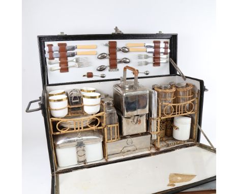 A 1930s motor car travelling picnic set for 4 people, by G W Scott &amp; Sons for Coracle, with original chrome plated fittin