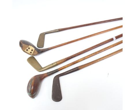 5 Vintage wood-shafted gold clubs, including 2 drivers, 2 irons, and 1 putter (5) 
