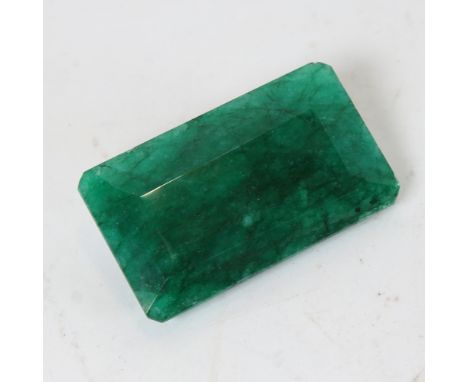 A 468ct unmounted rectangular emerald step-cut emerald, dimensions: 69.00mm x 41.00mm x 20.00mm, evidence of colour enhanceme