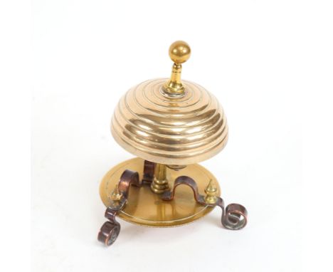 Vintage brass and copper desk bell, on scrolled feet, height 13.5cm 