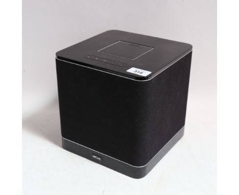 An Arcam rCube portable iPod speaker (no power cable)