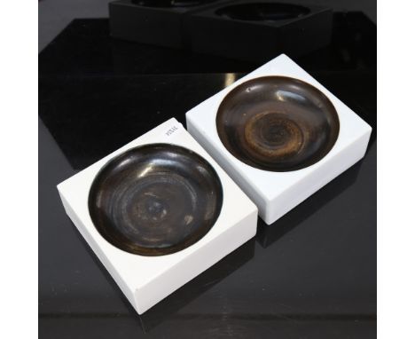 A pair of Troika ceramic dishes, artist's marks of Penny Black, 12cm x 12cm 