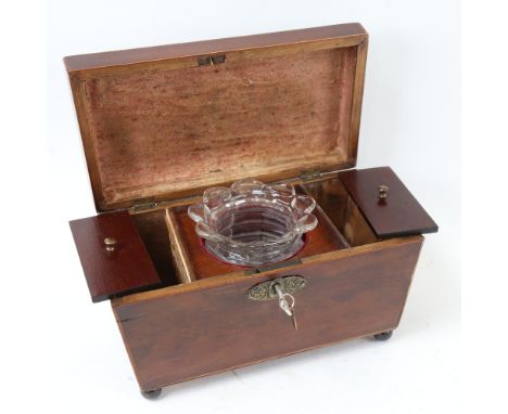 An early 19th century sarcophagus tea caddy, complete with glass mixing bowl, length 26cm 
