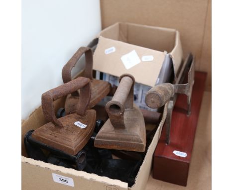 Various flat irons, scale weights, and a vintage roofer's slating axe and cutting bar.