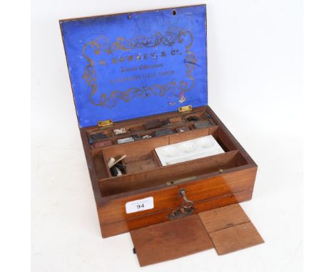A 19th century G Rowney &amp; Co mahogany artist's paintbox, with some original watercolours, and white glaze ceramic palette