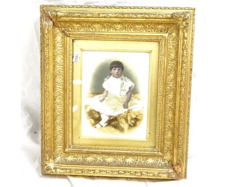 A Victorian print on opalescent glass, portrait of a child, in original gilt frame, overall frame size 39cm x 35cm 