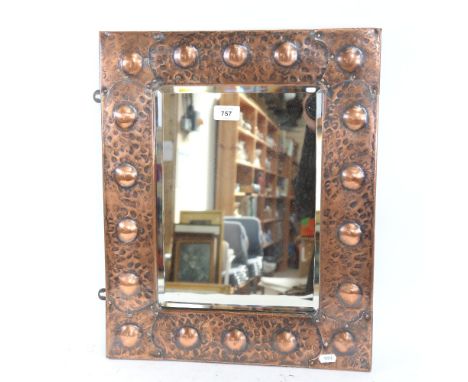 A Vintage bevel-edge mirror, in embossed copper frame, height 50cm 