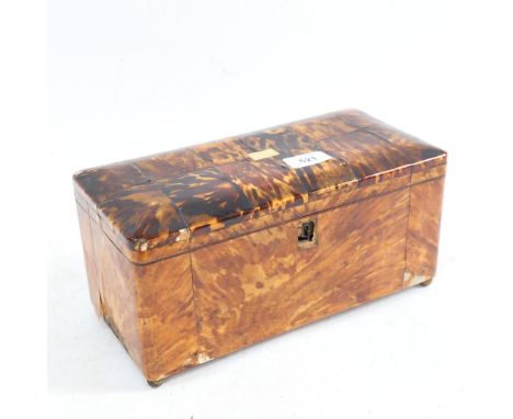 A 19th century tortoiseshell-clad tea caddy, length 29cm, and an ebony rule 